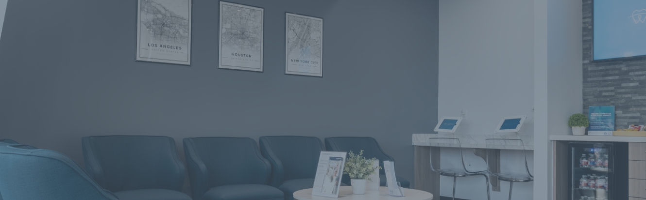 Calming blue armchairs in the waiting area of Highline Dental in Pecan Grove