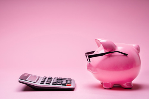 Piggy bank and calculator