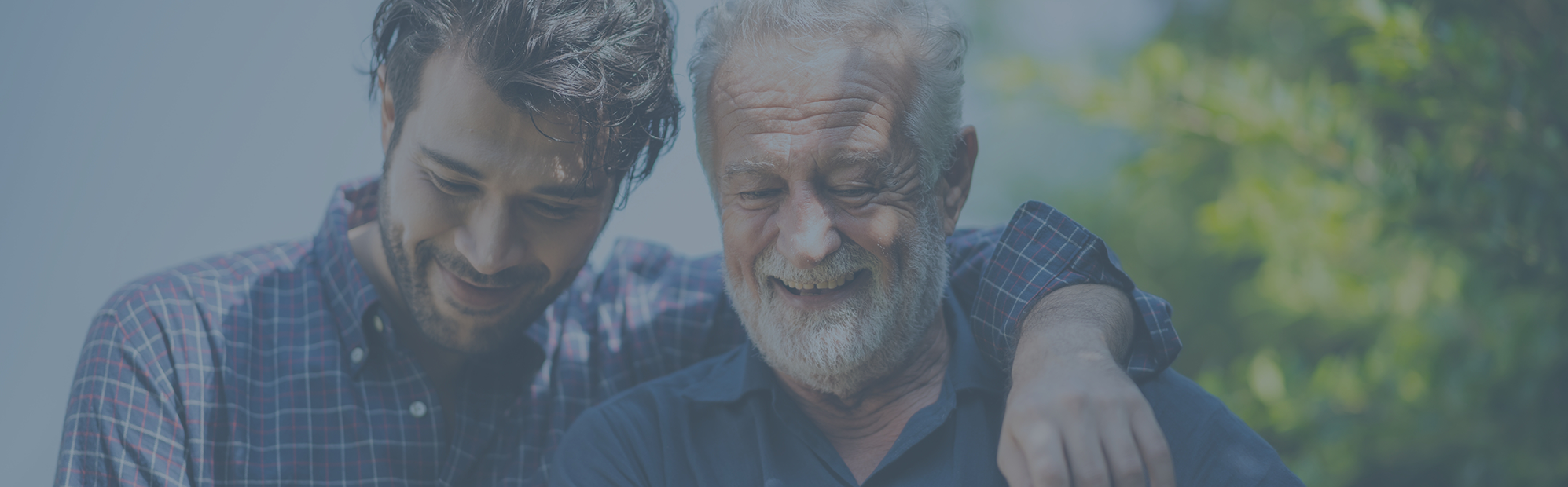 Young man walking with his grandfather