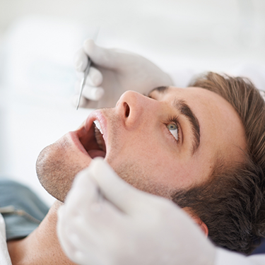 Young man getting a dental exam