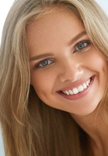 closeup of young woman smiling 