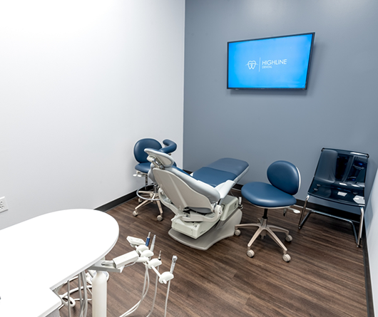 Empty dental exam chair at Highline Dental