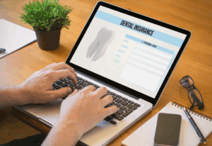 a patient examining a dental insurance form