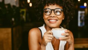 Woman drinking a latte